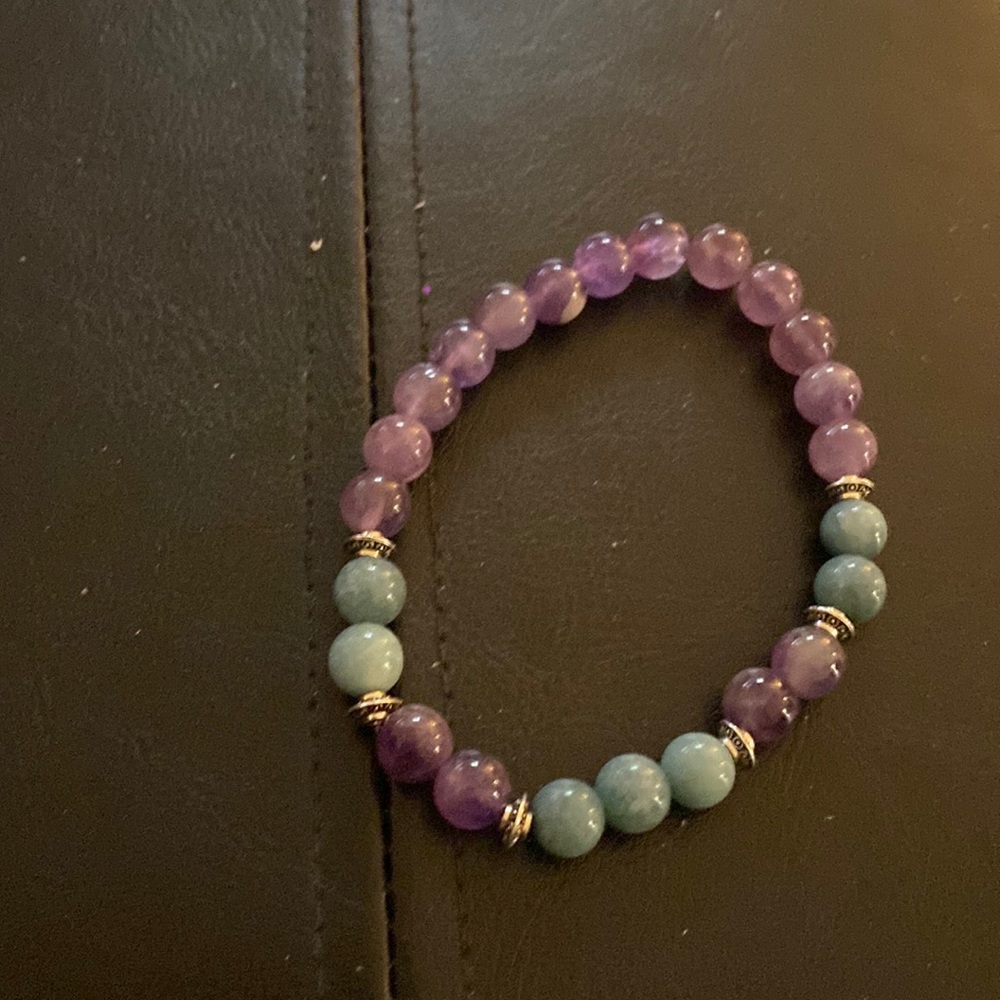 Brand new amethyst and aquamarine beaded bracelet.